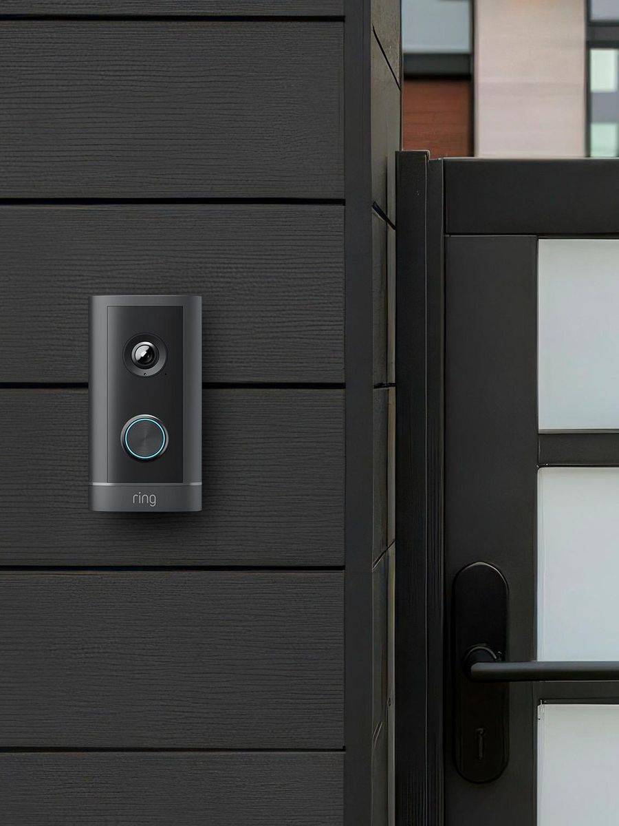 Ring video doorbell installed beside a front gate